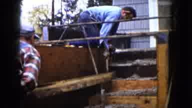 Wauconda Illinois USA (1960): Men Pouring Concrete Steps And Tapping The Sides Of