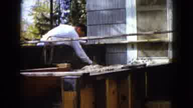 Wauconda Illinois USA (1960): A Man In His Thirties Scraping Built Up Sand Off His