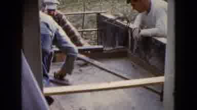 Wauconda Illinois USA (1960): Three Older Gentlemen Smoothing Out Cement On A