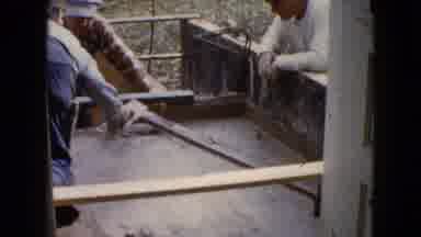 Wauconda Illinois USA (1960): Men Leveling Concrete