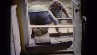 Wauconda Illinois USA (1960): Two Men Working Repairing Cement On A Porch Or Patio