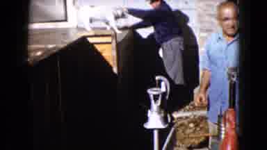 Wauconda Illinois USA (1960): The Dog Is Staying In Their House Kennel And The