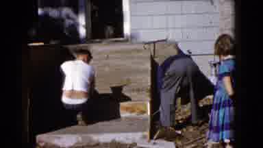Wauconda Illinois USA (1960): Two Men Wrecking The Forms Off The Cured Concrete Of