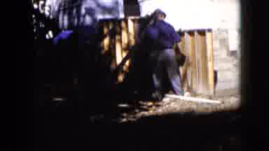 Wauconda Illinois USA (1960): A Man In A White Shirt And A Man In A Blue Shirt