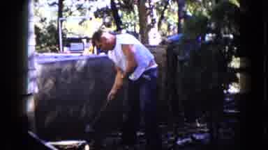 Wauconda Illinois USA (1960): Man Wearing Jeans And Shirt Hammers With A Sledge