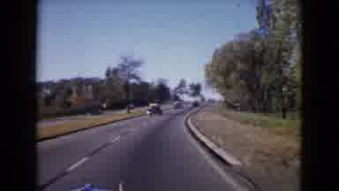 Wauconda Illinois USA (1960): There Is A Long Road And The Vehicles Are Going In
