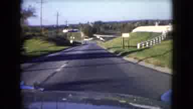 Wauconda Illinois USA (1960): The Car Is Travelling Very Fastly In The Roadside