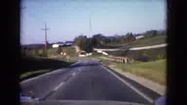 Wauconda Illinois USA (1960): A Highway Passing Amid A Village Where Some Vehicles