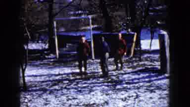 Wauconda Illinois USA (1960): Three People Looking To The Camera On A Snowy Yard
