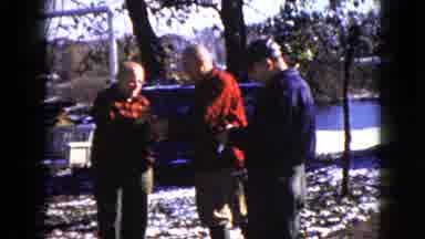Wauconda Illinois USA (1960): Men Wearing Flannel Shirts Have A Conversation In