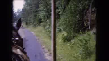 Buffalo New York USA (1961): A Person Riding A Horse Down A Street