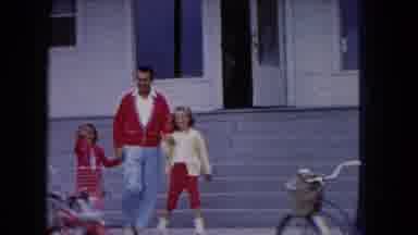 Buffalo New York USA (1961): Children Are Waving Hands To Camera Who Are Walking