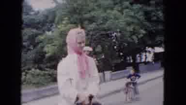 Buffalo New York USA (1961): Blonde Woman In White Garments Wears Pink Headdress
