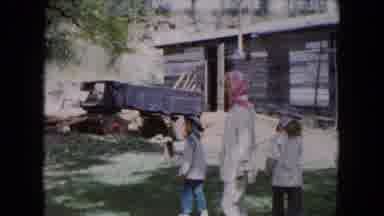 Buffalo New York USA (1961): Woman Wearing White Coat Walks To Brown Horse On A