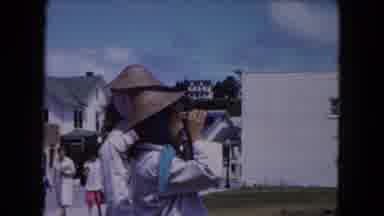 Buffalo New York USA (1961): Two Young Girls Looking Out Through Binoculars In A