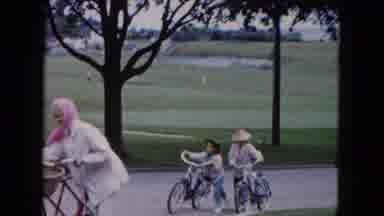 Buffalo New York USA (1961): Grandmother And Granddaughters Pushing Bicycles