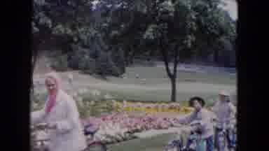 Buffalo New York USA (1961): A Woman And Two Children Pull Their Bicycles In The