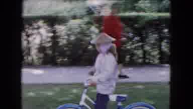 Buffalo New York USA (1961): Little Girl Riding Vintage Bicycle Outside On Road