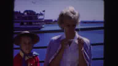 Buffalo New York USA (1961): Mother Adjusting Sunglasses On Ship With Her Two