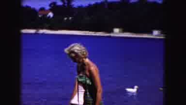 Buffalo New York USA (1961): Woman And Girl Wearing One-Piece Bathing Suits Stroll