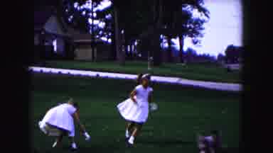 Buffalo New York USA (1961): Two Little Girls Playing With A Puppy In The Yard