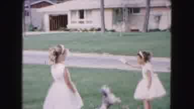 Buffalo New York USA (1961): Two Little Girls Playing With A Little Dog By