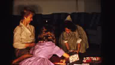 Buffalo New York USA (1961): Girls Opening Presents And Receiving Dolls