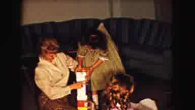 Buffalo New York USA (1961): Family Opening Presents On Christmas In The 1950s