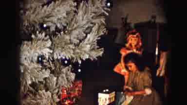Buffalo New York USA (1961): Girl In A Dress At Christmas Sitting By A Tree