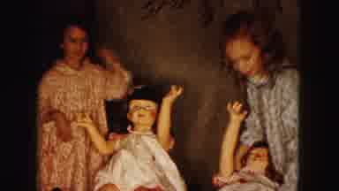 Buffalo New York USA (1961): Two Girls Playing And Laughing With A Doll