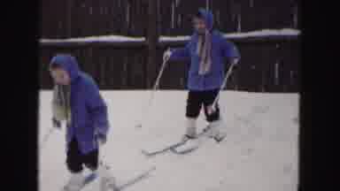 Buffalo New York USA (1961): Children Play With Their Skis In The Snow In Their