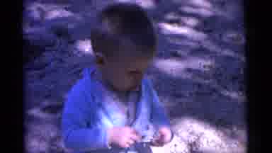Camden New Jersey USA (1961): A Little Boy Is Playing With His Toy In The Garden