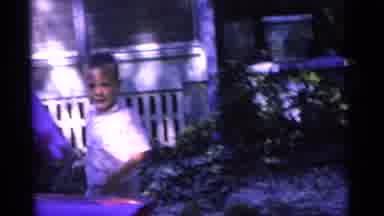 Camden New Jersey USA (1961): Two Children Play In The Yard Chasing Each Other In