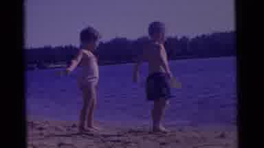 Camden New Jersey USA (1961): Two Small Children Using Little Shovels To Scoop