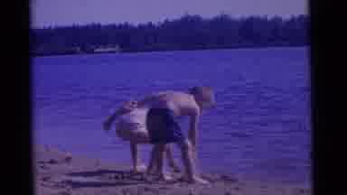 Camden New Jersey USA (1961): Two Young Children Using Little Shovels To Scoop
