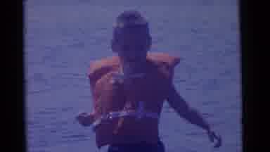 Camden New Jersey USA (1961): Little Boy Wearing A Life Jacket Standing In Front