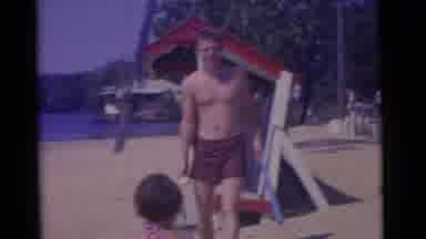 Camden New Jersey USA (1961): Young Adult Playing Baseball With A Young Child On