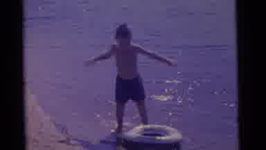 Camden New Jersey USA (1961): Dad And Daughter Play A Game In The Sand While A Boy