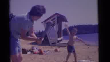 Camden New Jersey USA (1961): Woman And Small Boy Playing With A Ball And Bat On