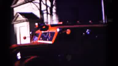 Hagerstown Maryland USA (1961): Old Timey Fire Engine Turning Onto Road From