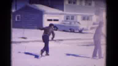 Hagerstown Maryland USA (1961): Baby Wearing White Snowsuit Reaches For Object