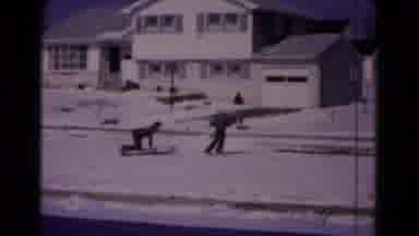 Hagerstown Maryland USA (1961): Young Boy Pulling Friend On A Sled In The Snow