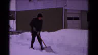 Hagerstown Maryland USA (1961): Boy Runs To Gain Momentum To Push Snow And Falls