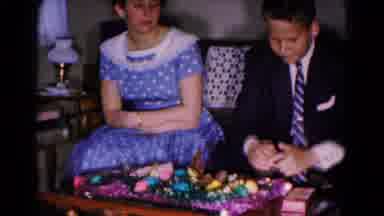 Hagerstown Maryland USA (1961): Oy And Girl Wearing Blue Attire Sit On Sofa