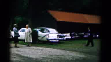 Hagerstown Maryland USA (1961): People Talking At A Car Show As Another Person