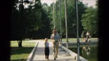 Hagerstown Maryland USA (1961): Smoking Father And Young Son Walking Next To