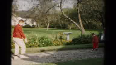 Hagerstown Maryland USA (1961): A Teenage Boy And A Young Boy Playfully Throw