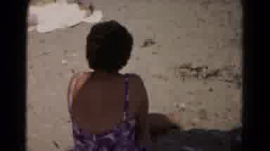 Hagerstown Maryland USA (1961): Woman Lounging In The Shade Of Her Umbrella At The