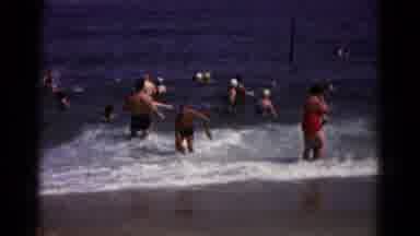Hagerstown Maryland USA (1961): Man Wearing Black Shorts Walks Out Of Crowded