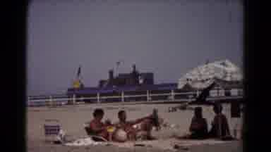 Hagerstown Maryland USA (1961): People Walking And Relaxing On A Beach